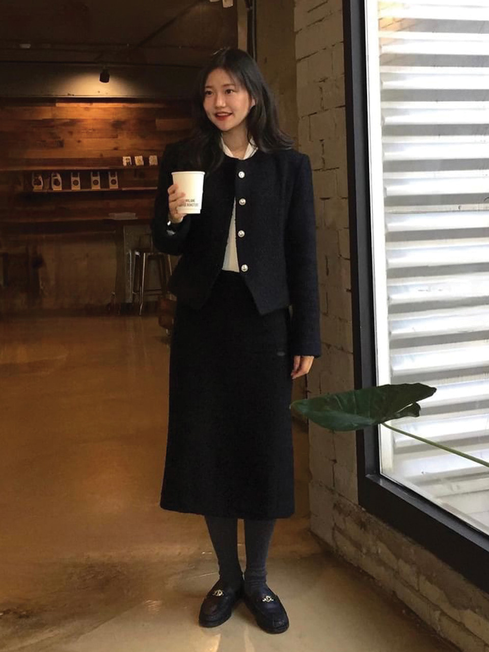 Modern black tweed skirt